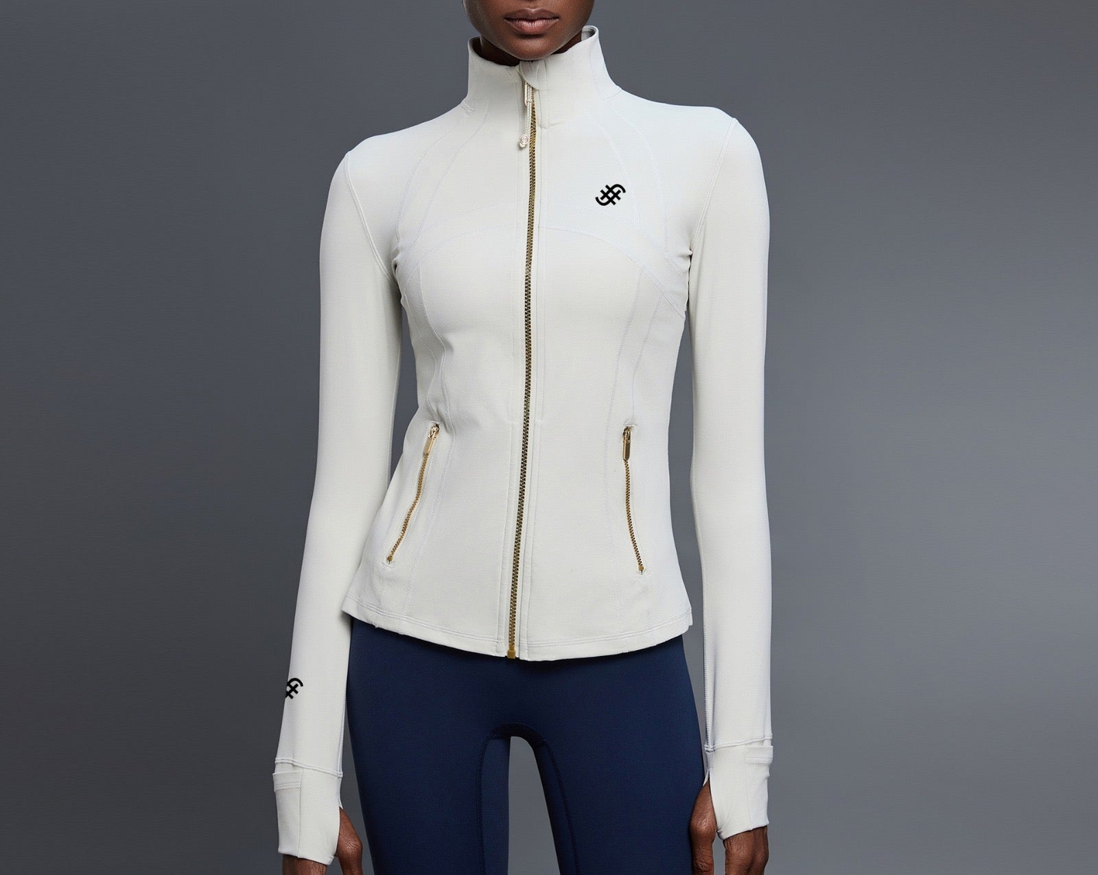 Strider 2 Jacket | Women's Slim Fit Gym Jacket with Gold Zip | Ivory in - Jackets activewear
